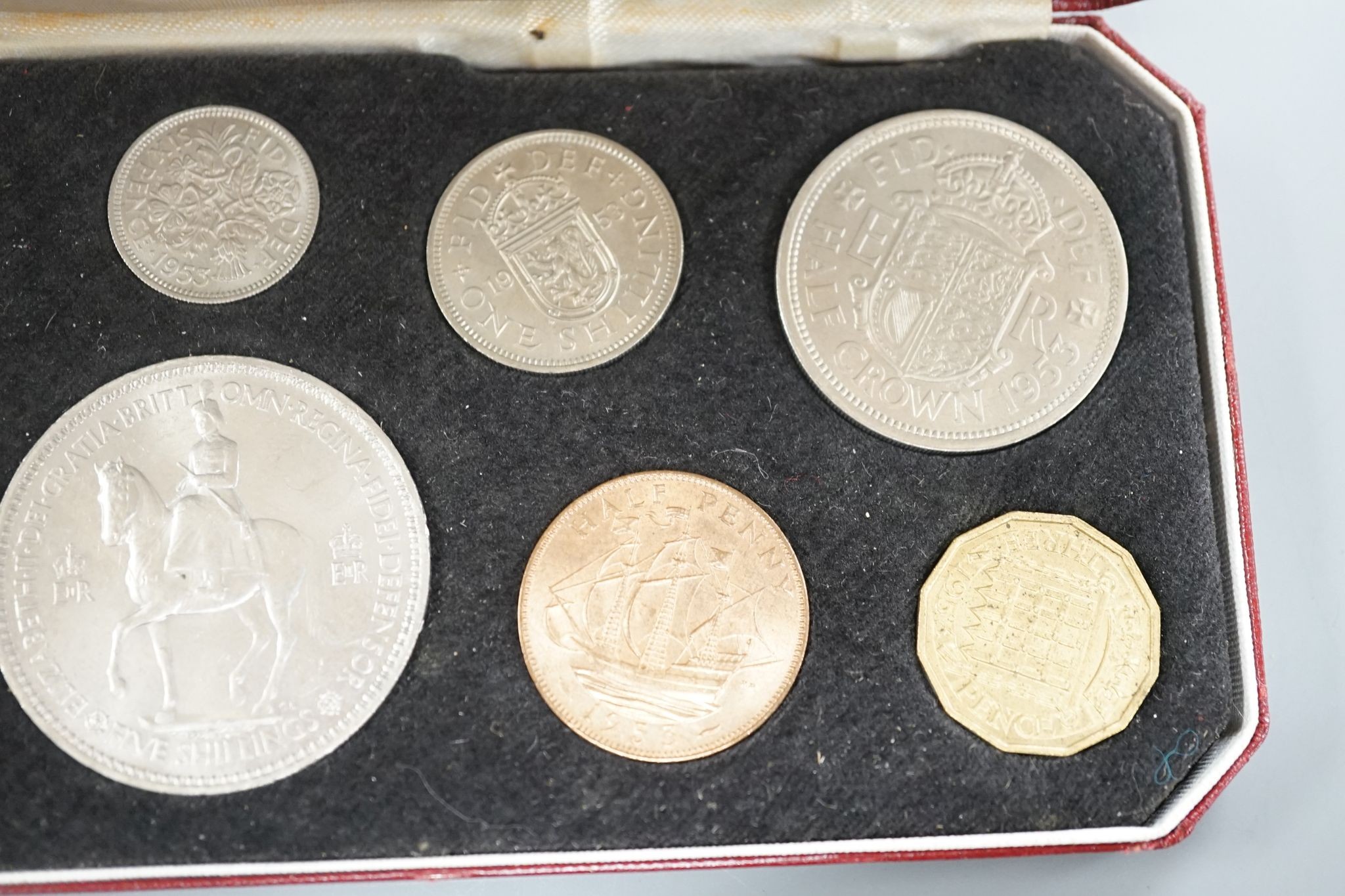 A Royal Mint Queen Elizabeth II cased set of coronation year coins 1953, UNC and a 1965 UNC set